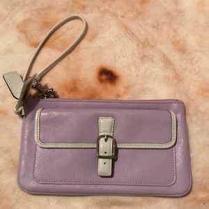 Lilac and White Coach wristlet.